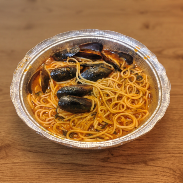 Mussels Marinara Over Pasta.